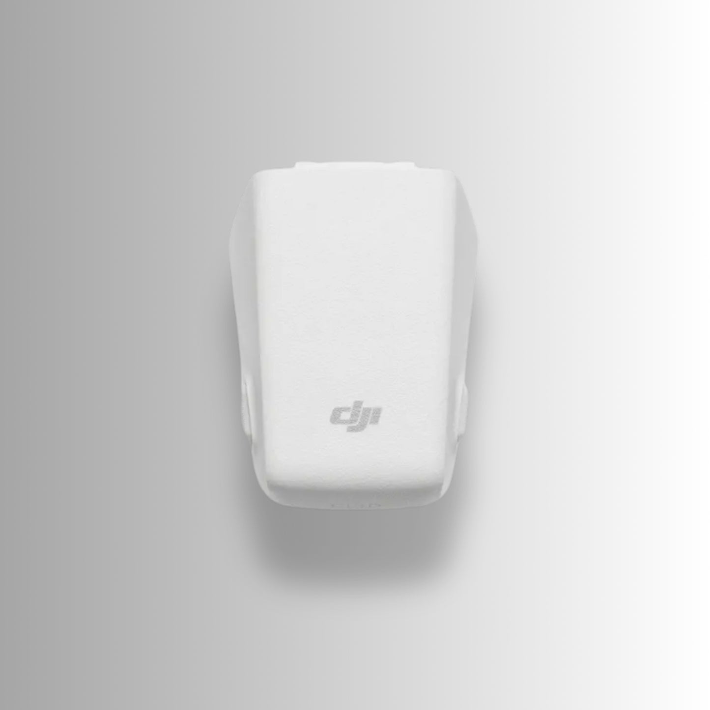 DJI Flip Intelligent Flight Battery in sleek white design for enhanced aerial adventures.