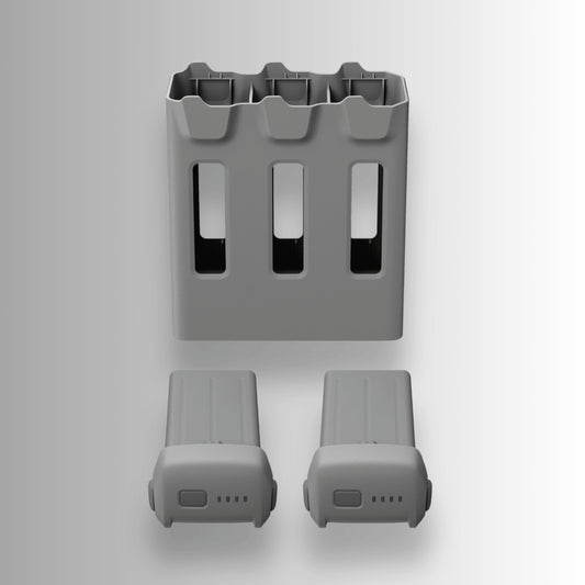 DJI two-way charging hub with two intelligent flight batteries for the DJI avata 360 on a light gray background