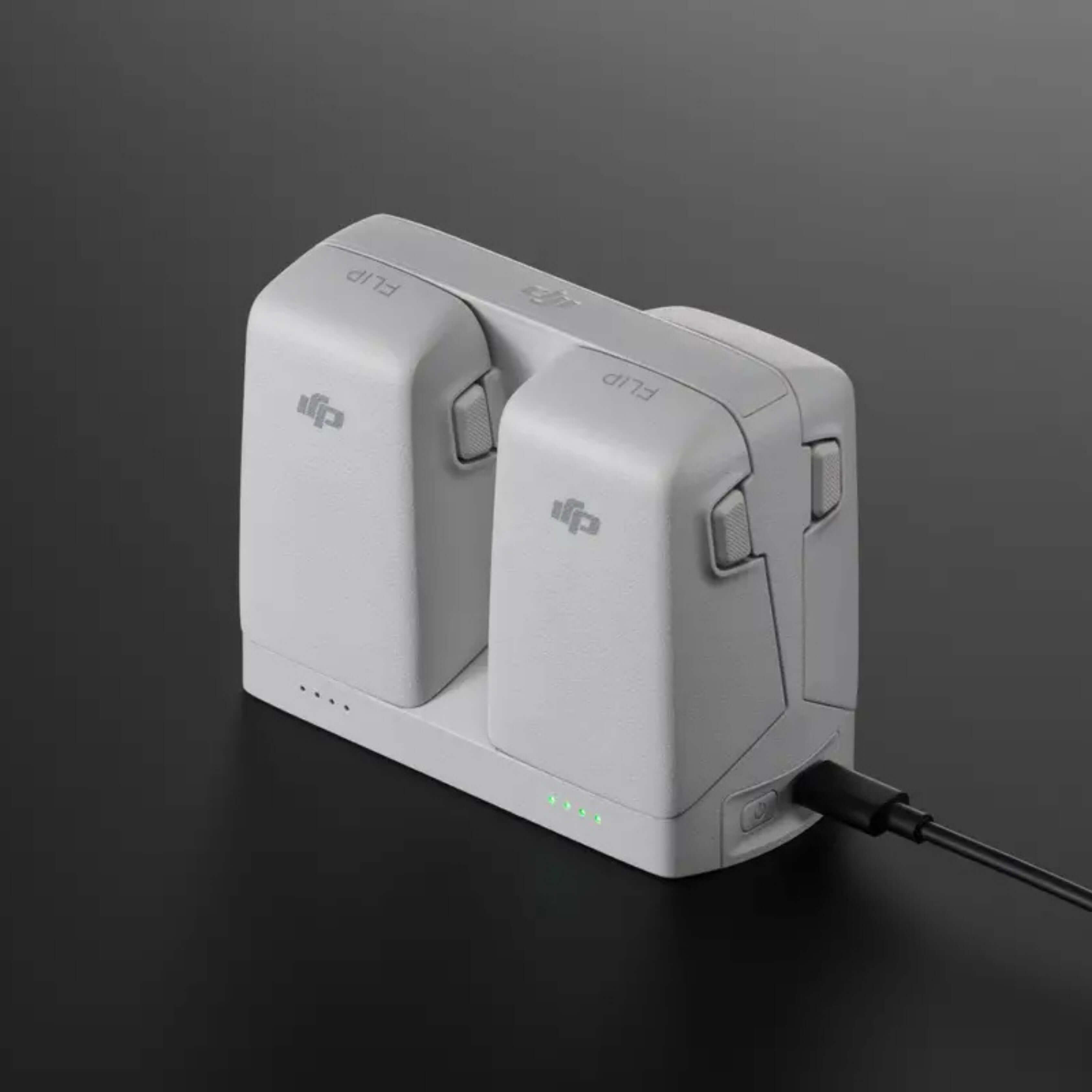 DJI Flip Parallel Charging Hub with two batteries, designed for efficient simultaneous charging.