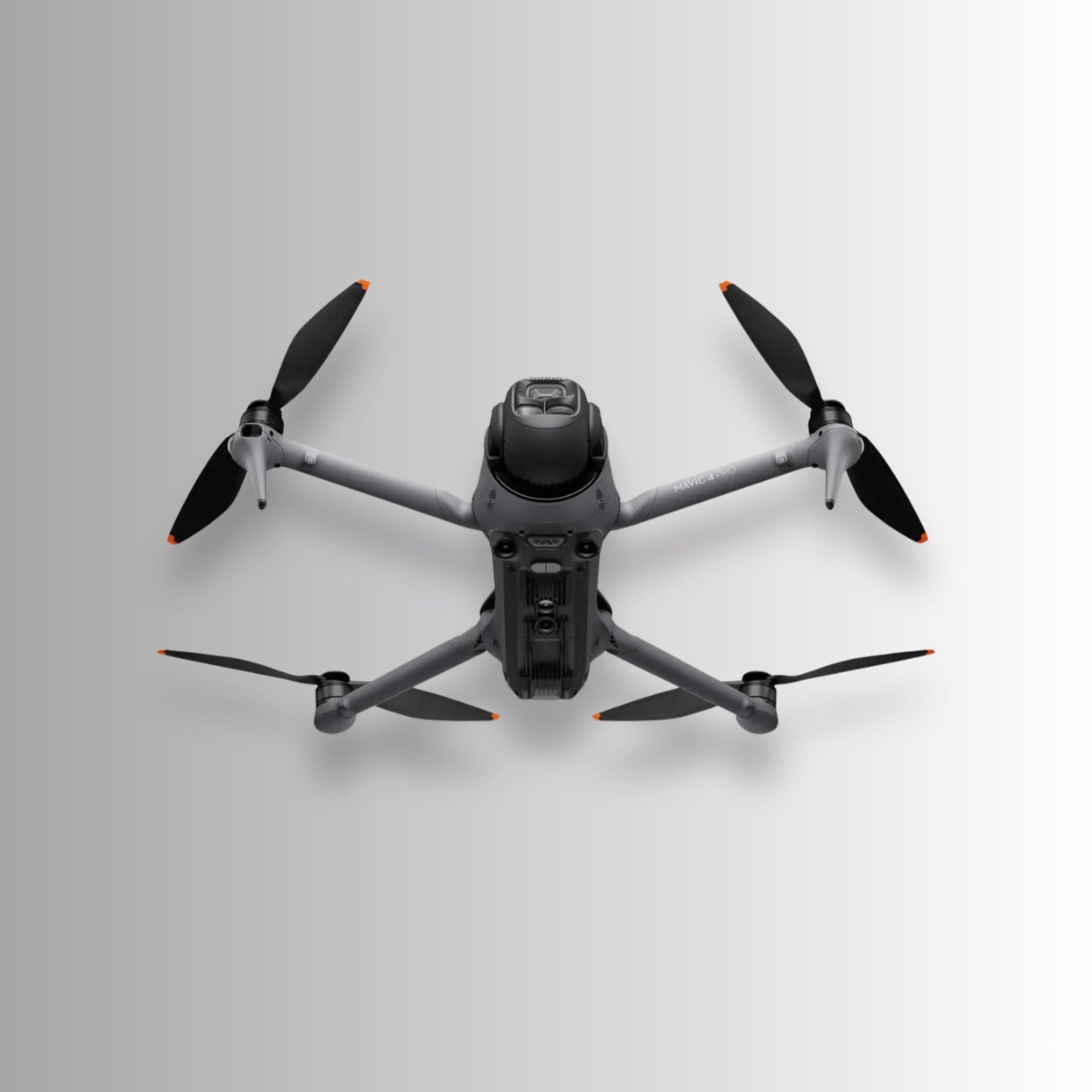 underneath the dji mavic 4 pro drone on a light gray background