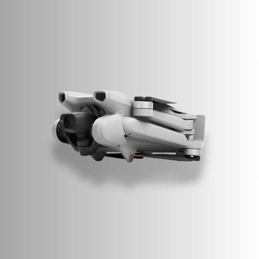 Folded DJI Mini 3 drone showcasing its compact design and lightweight features for easy transport.