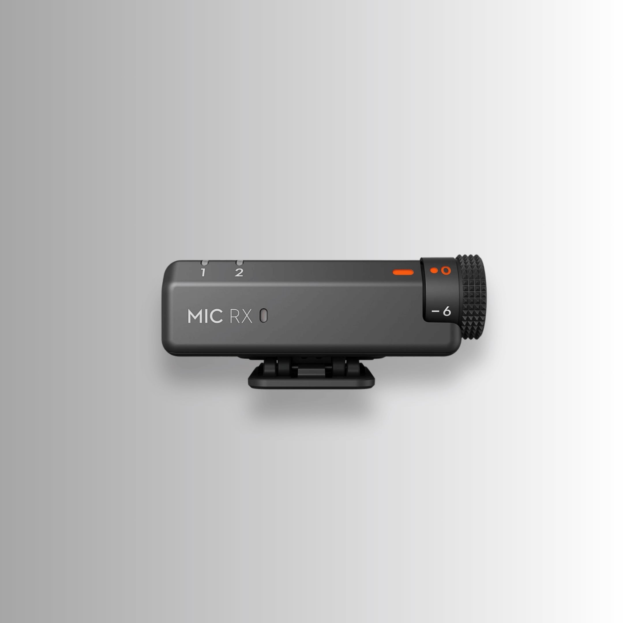 DJI Mic Mini receiver showing volume adjustment and dual-channel input design for vlogging and filmmaking