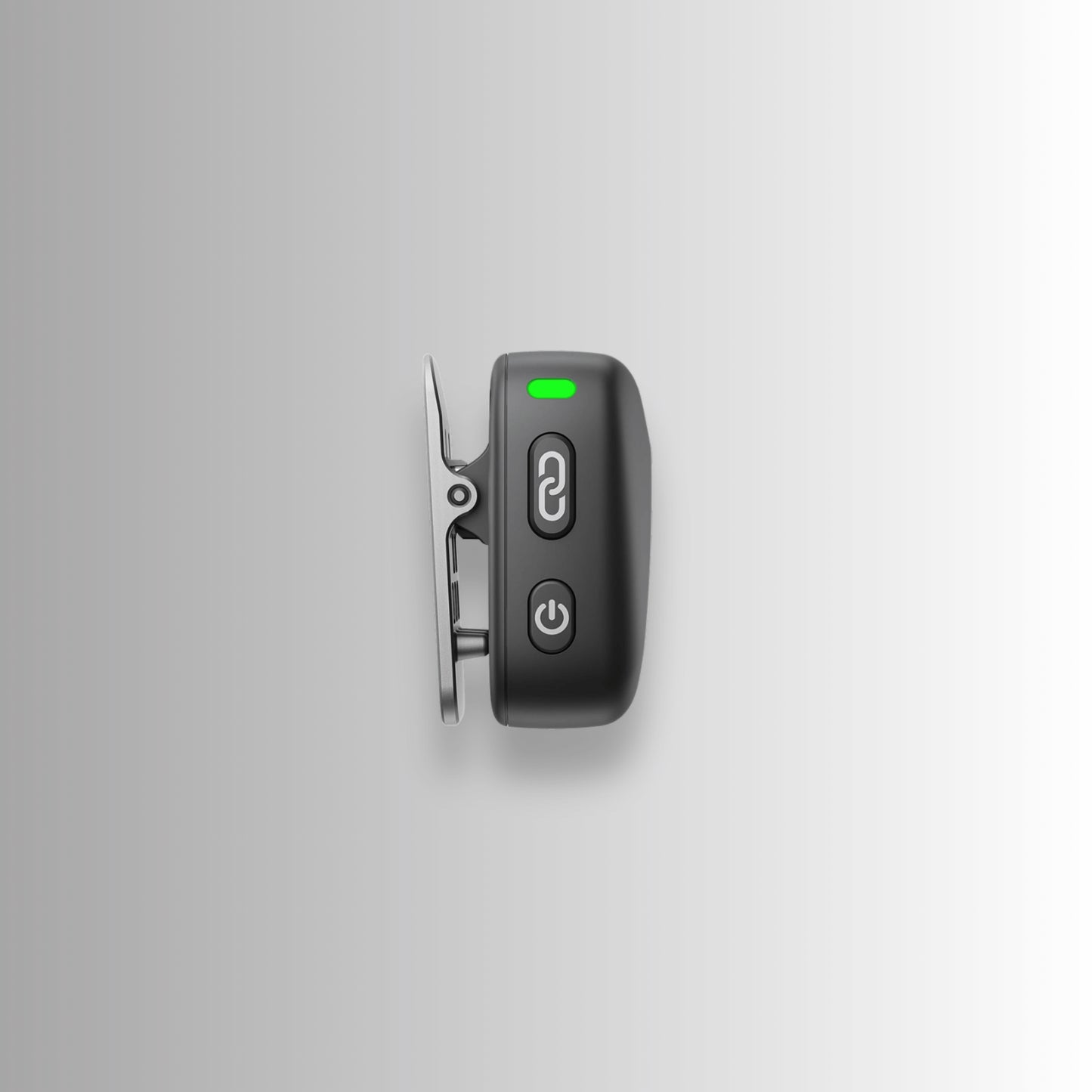 DJI Mic Mini clip and power buttons close-up — easy-attach wireless microphone system for content creators