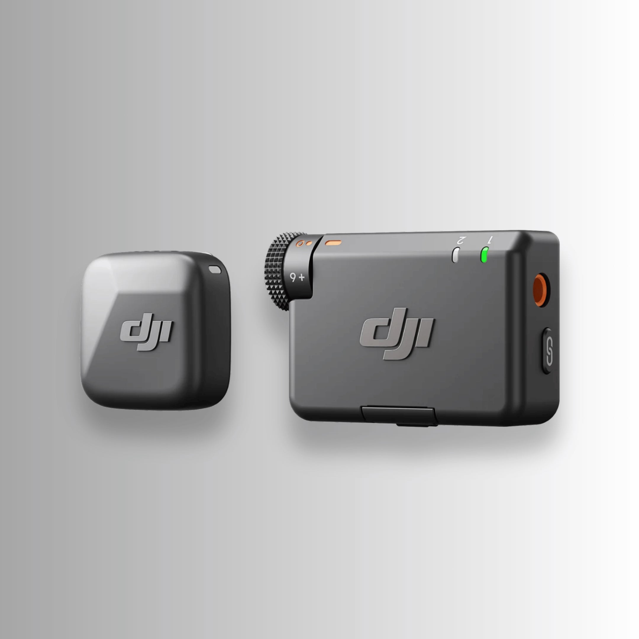Close-up of DJI Mic Mini transmitter and receiver in matte black — compact wireless audio system for DJI Mini 5 Pro, Osmo Pocket 3, and Mavic drones.