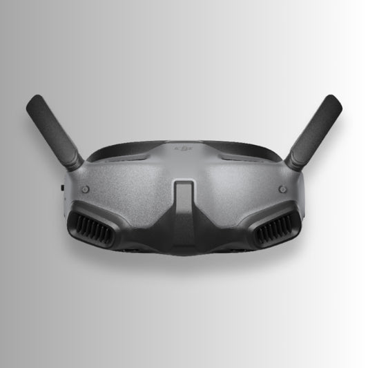 Black dji goggles integra with DJI logo on a gray background