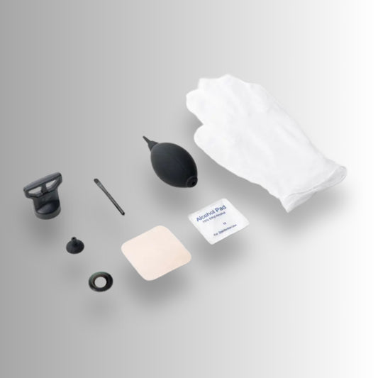 Collection of DJI Avata 360 camera cleaning tools including a black brush, white cloth, and small containers on a grey background