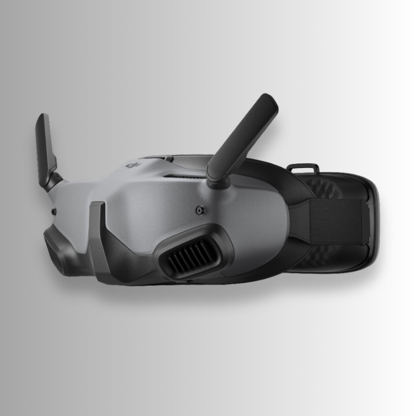Black dji goggles integra with DJI logo on a gray background