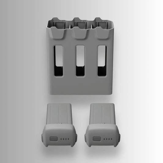 DJI two-way charging hub with two intelligent flight batteries for the DJI avata 360 on a light gray background