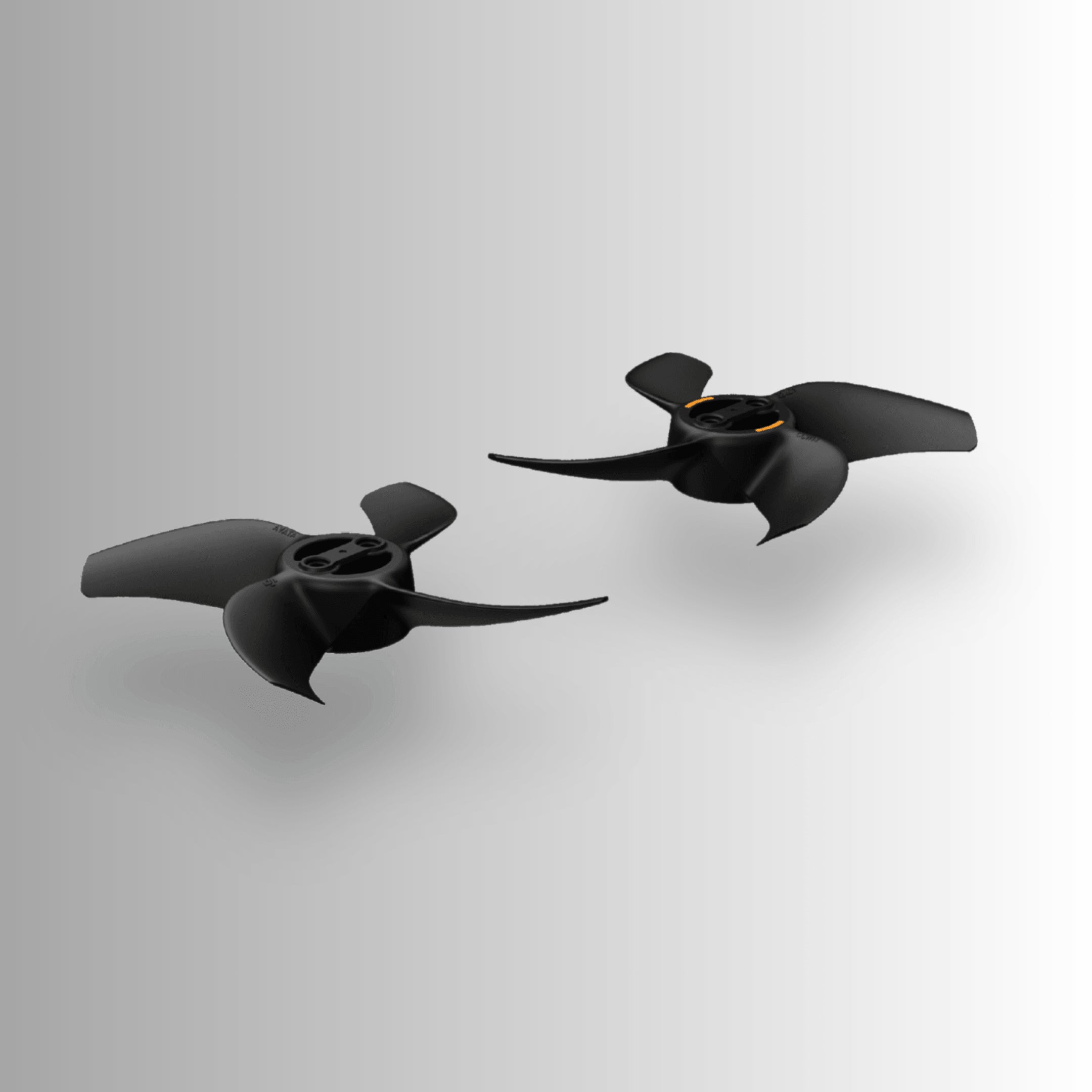 Two angled black DJI Avata 360 drone propellers on a light gray background