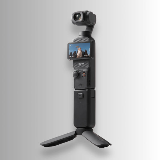 DJI Osmo Pocket 3 Creator Combo with battery handle and mini tripod attached, 1-inch CMOS gimbal camera