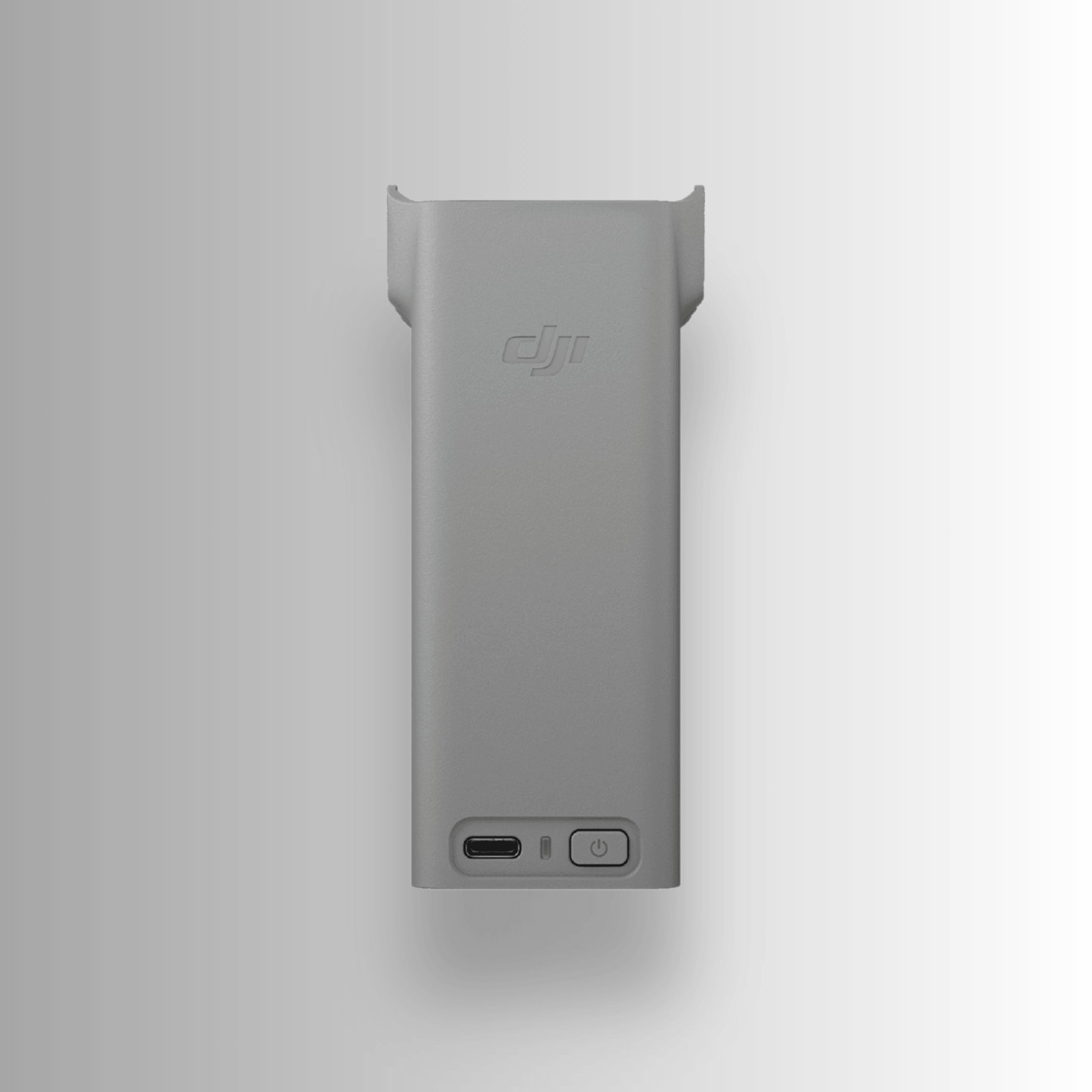 Side angle of a Grey two-way charging hub with multiple slots and a USB port for DJI Avata 360 on a white background
