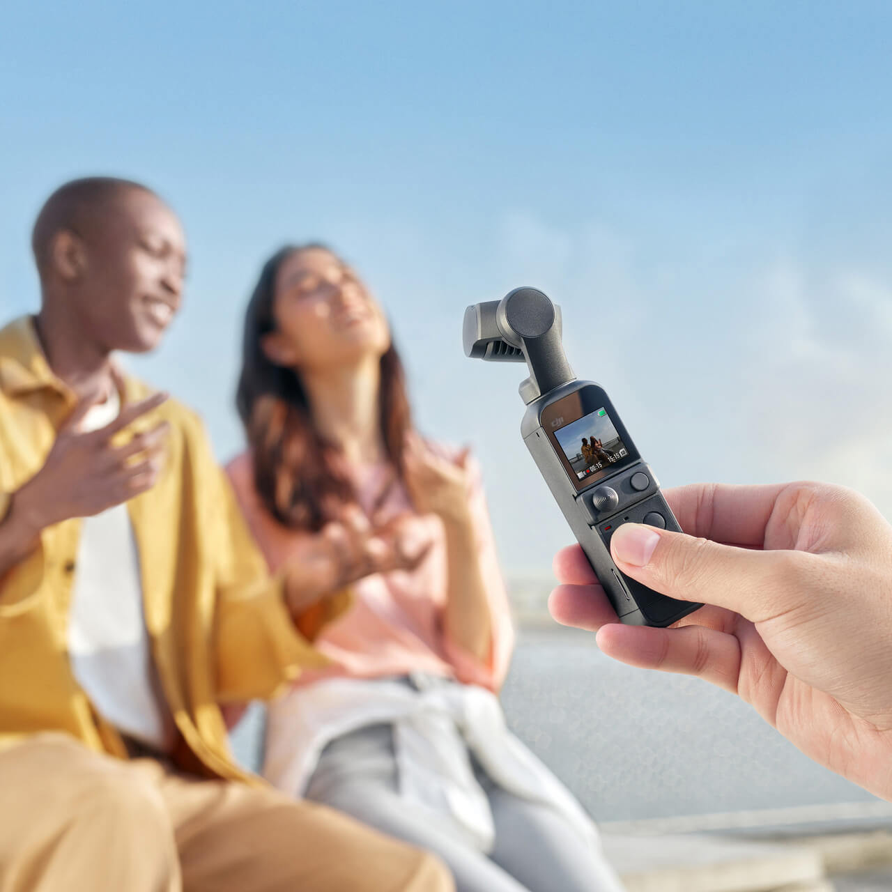 DJI Pocket 2 Creator Combo in use filming people outdoors, ideal for vlogging, travel videos and content creators