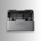 DJI Mic Mini charging case with dual transmitters and receiver inside — compact charging dock for wireless mic system