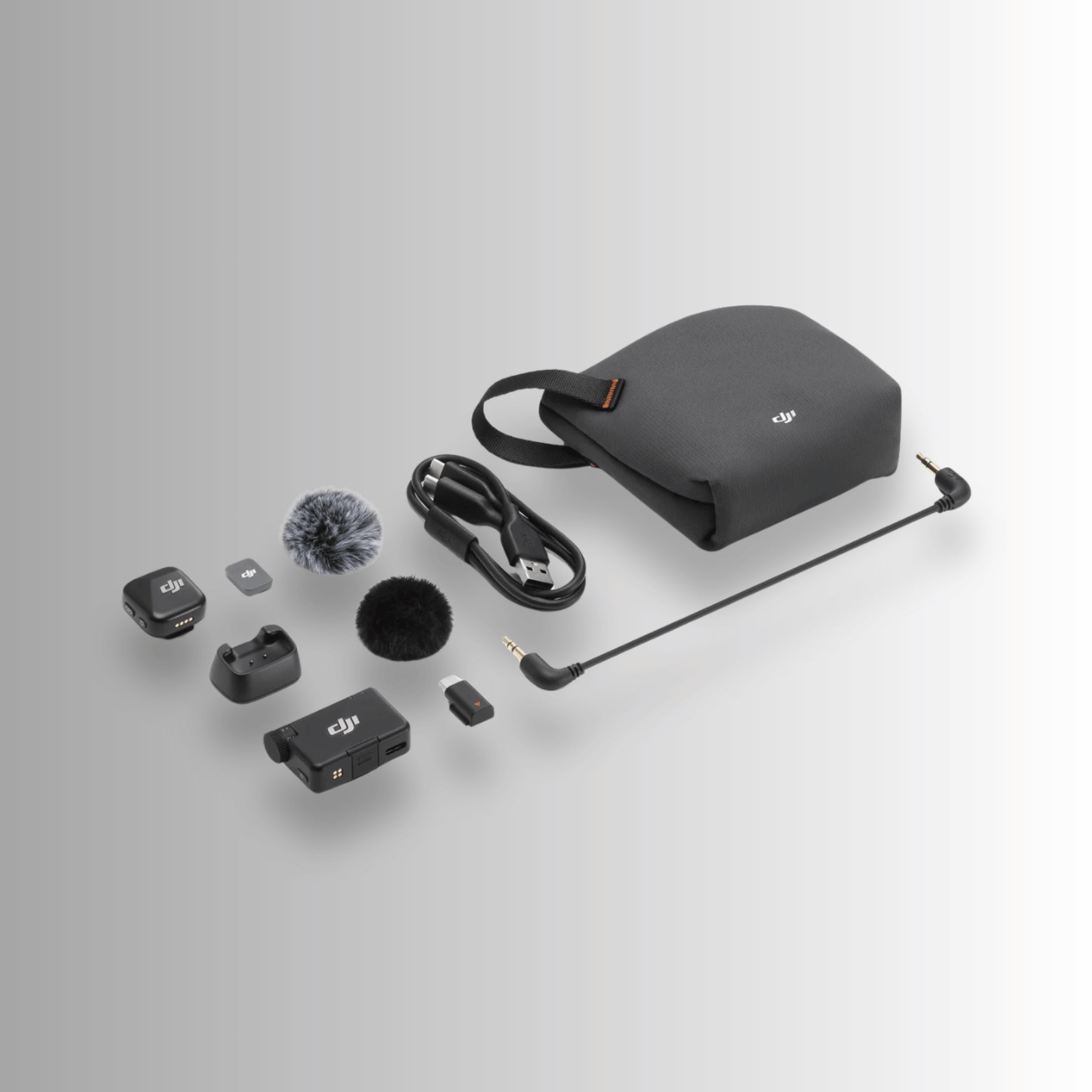 DJI Mic Mini 1 TX + 1 RX wireless microphone kit with transmitter, receiver, windscreens, USB-C cable, and carrying pouch for DJI cameras and drones.