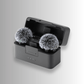 DJI Mic Mini transmitters with furry windshields placed in charging case for outdoor audio recording